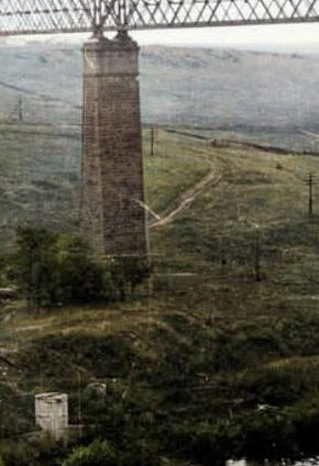 Міст Белелюбського через річку Інгулець та водокачка, світлина часів німецької окупації