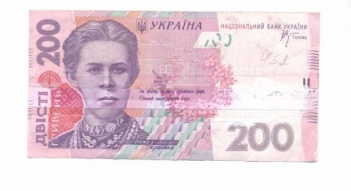 На Днепропетровщину хлынули фальшивки, склеенные из сувенирных денег