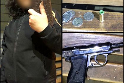 На остановке общественного транспорта криворожанка размахивала пистолетом